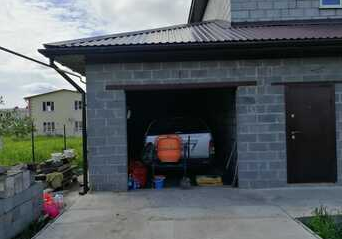 Холодный гараж-пристрой из вибропрессованных блоков собственного производства