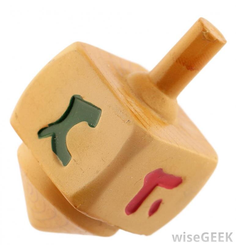 Dreidel, a gambling game, is often played during Hanukkah.