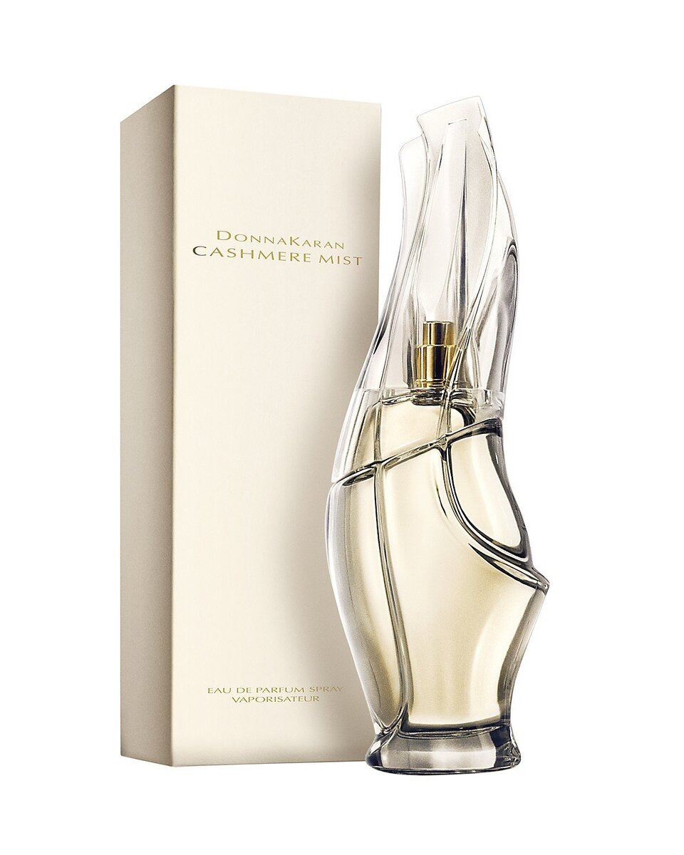 Cashmere mist de donna karan. Очень популярный аромат, который в основном используется в дневное время. Он практически не ощутим, оставляет за собой легкий шлейф. Сочетаются в аромате нотки ванили, сандаловое дерево, а также сладость жасмина. Аромат оценили многие из знаменитостей, а также известных певиц. Запах достаточно свежий, поэтому подойдет для молодой девушки, а также для женщины до 35 лет.  Cashmere mist de donna karan