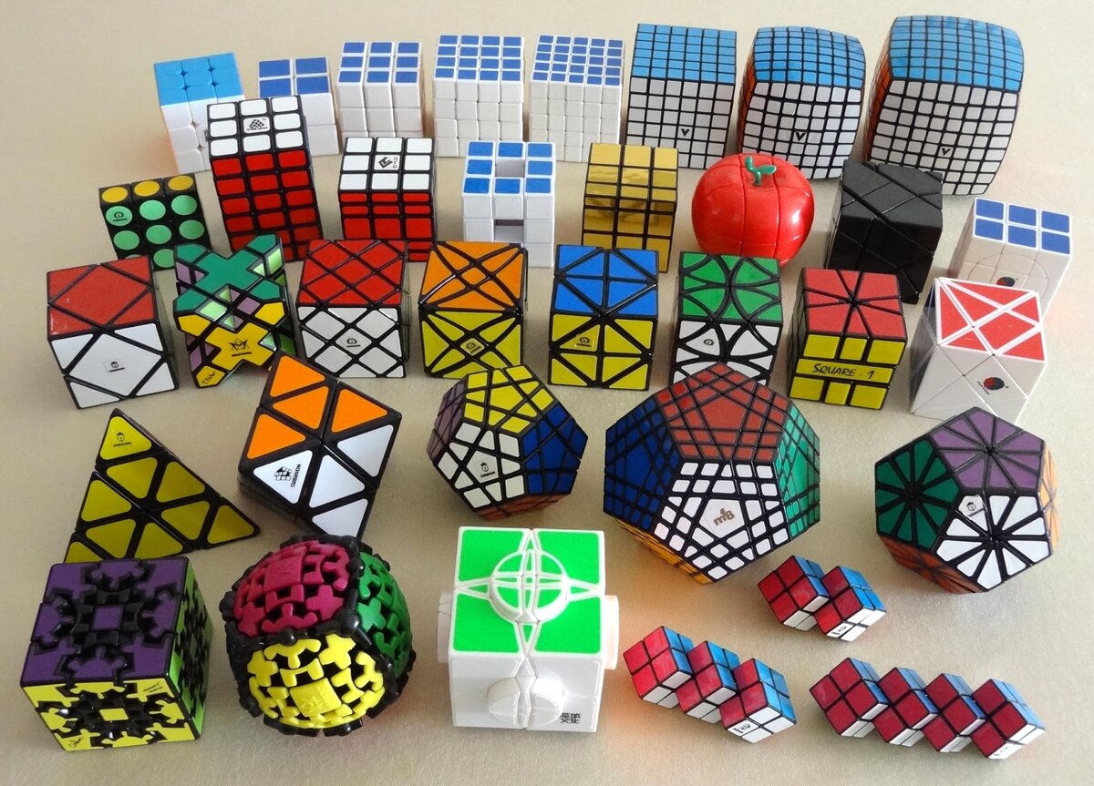 Фотография: Разнообразие фигур на гранях кубика: от простых линий до сложных и сюрреалистических композиций.