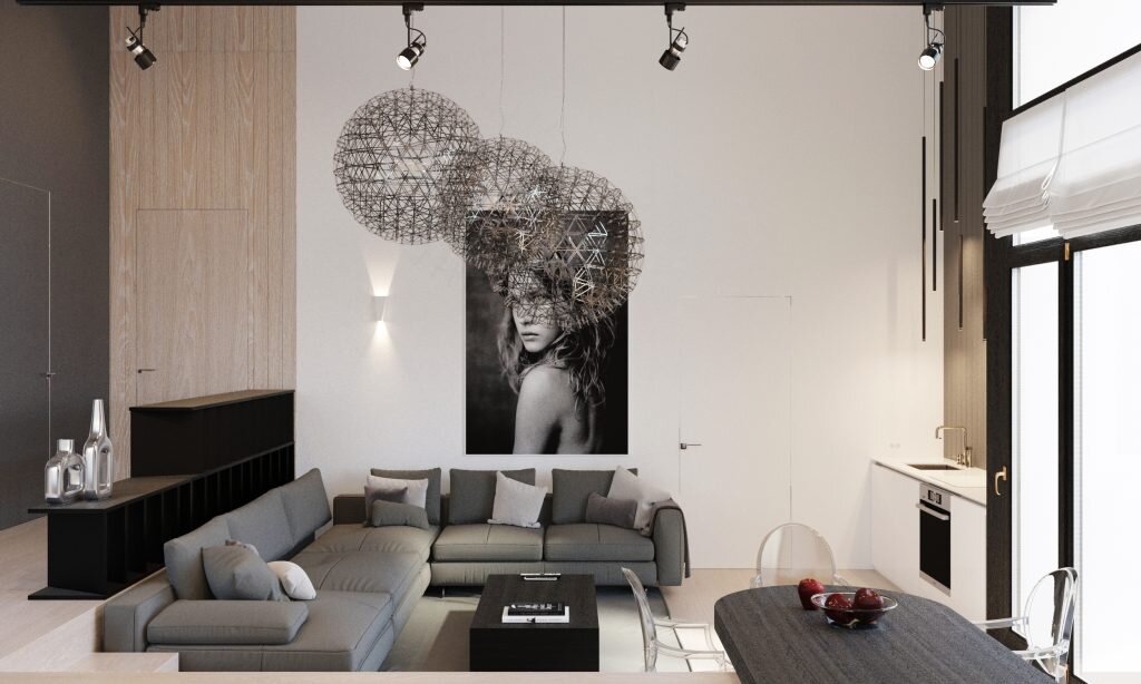 Главный фасад дома обратили в сторону водоема. В этом же направлении разместили две террасы, открытый внутренний дворик и береговую линию, к которым плавно опускается лестница. С обратной стороны дома расположили навес для стоянки автомобилей и центральный вход.