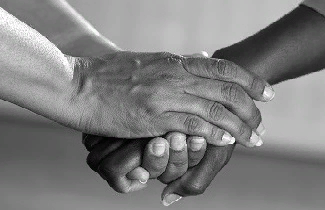 https://drugfree.org/wp-content/uploads/2017/08/comforting-clasped-hands-parent-and-child.jpeg