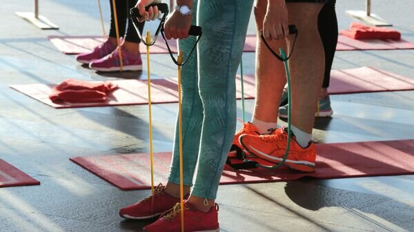    Участники фитнес-тренировки в Московском метрополитене© РИА Новости / Виталий Белоусов