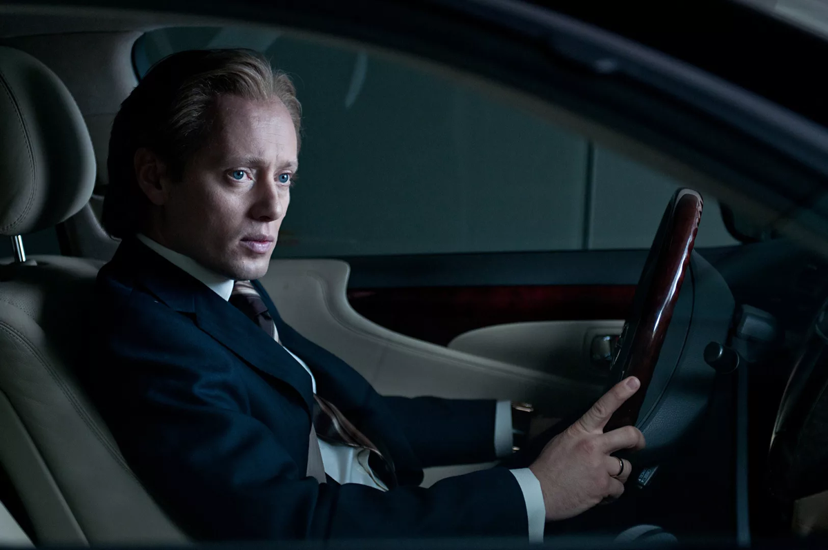 Аксель Хенни на кадре в фильме "Охотники за головами"