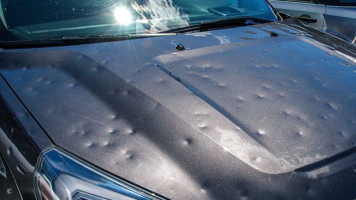 Автомобиль поврежденный от града