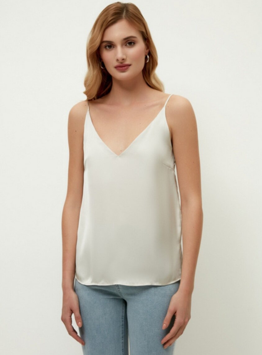 Цена на сайте бренда Зарина - 1499 руб. вместо 1599 руб. Размер - до 50. 