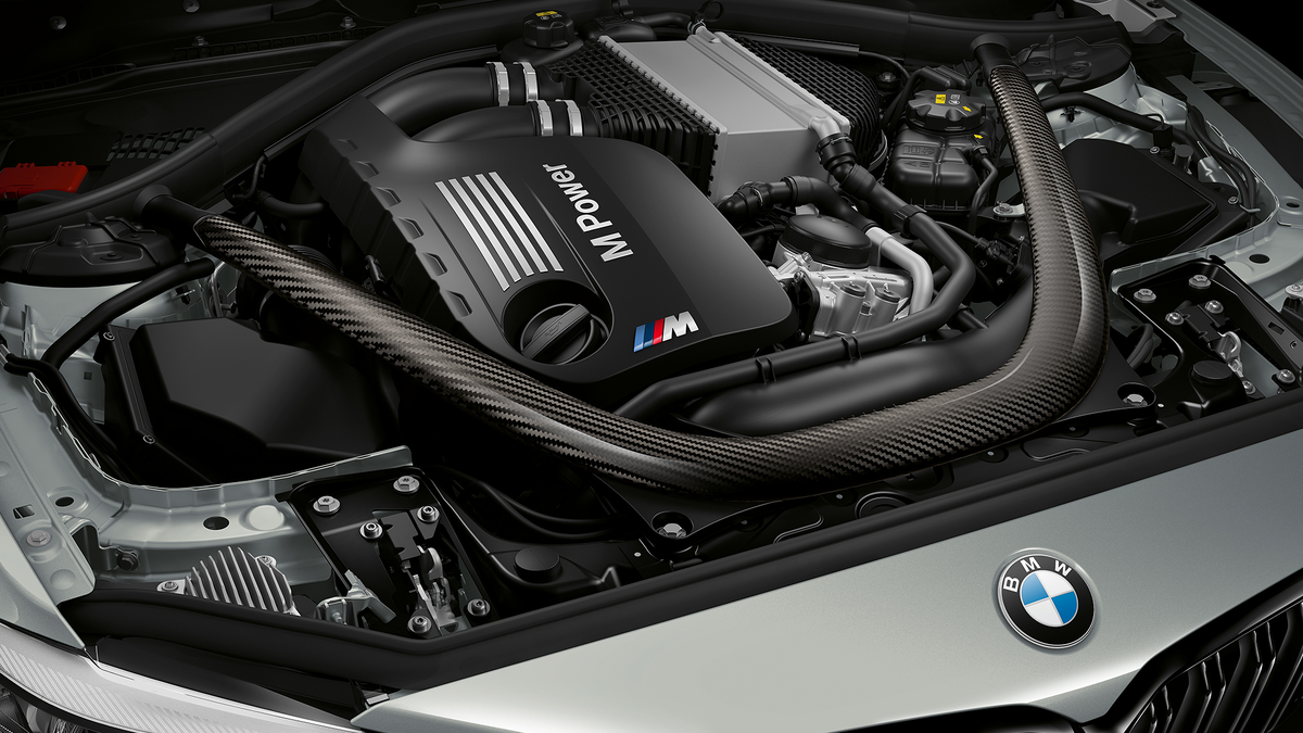 Новые двигатели бмв. BMW m2 engine. BMW m2 Competition двигатель. Двигатель BMW x6m. BMW m6 Competition мотор.