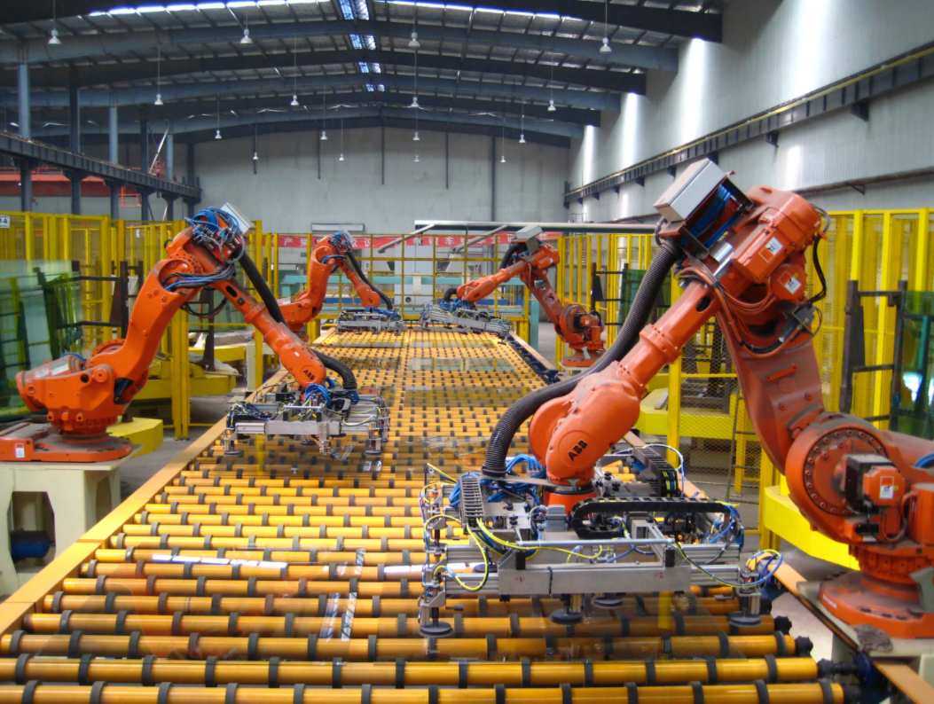 Цех роботов. Промышленные роботы. Роботы в промышленности. Механизация и автоматизация производства. Промышленный робот на заводе.