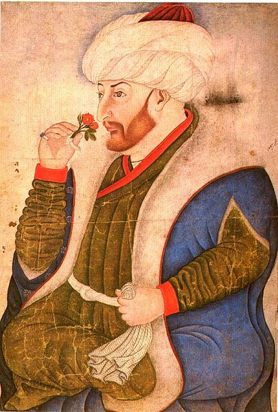 Фотография из Википедии: Мехмед II, завоевавший Константинополь, нюхает розу