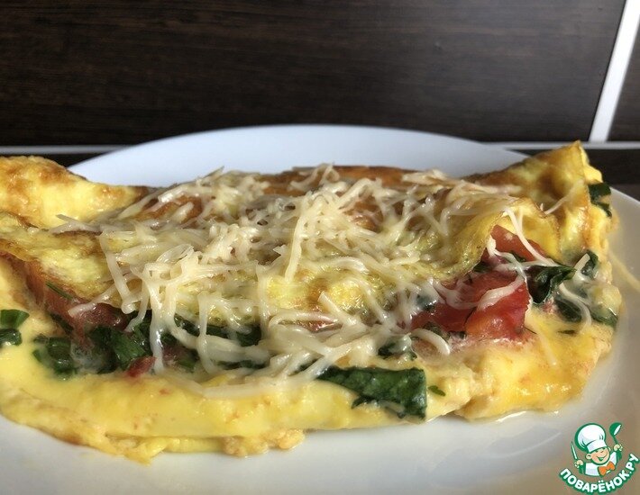 Омлет со шпинатом и помидорами - это быстрый, вкусный завтрак, который вам подарит заряд бодрости на целый день!