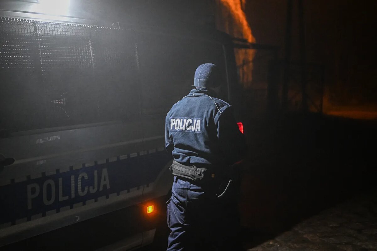 Полицейское оцепление на месте падения ракеты в селе Пшеводув, 16 ноября