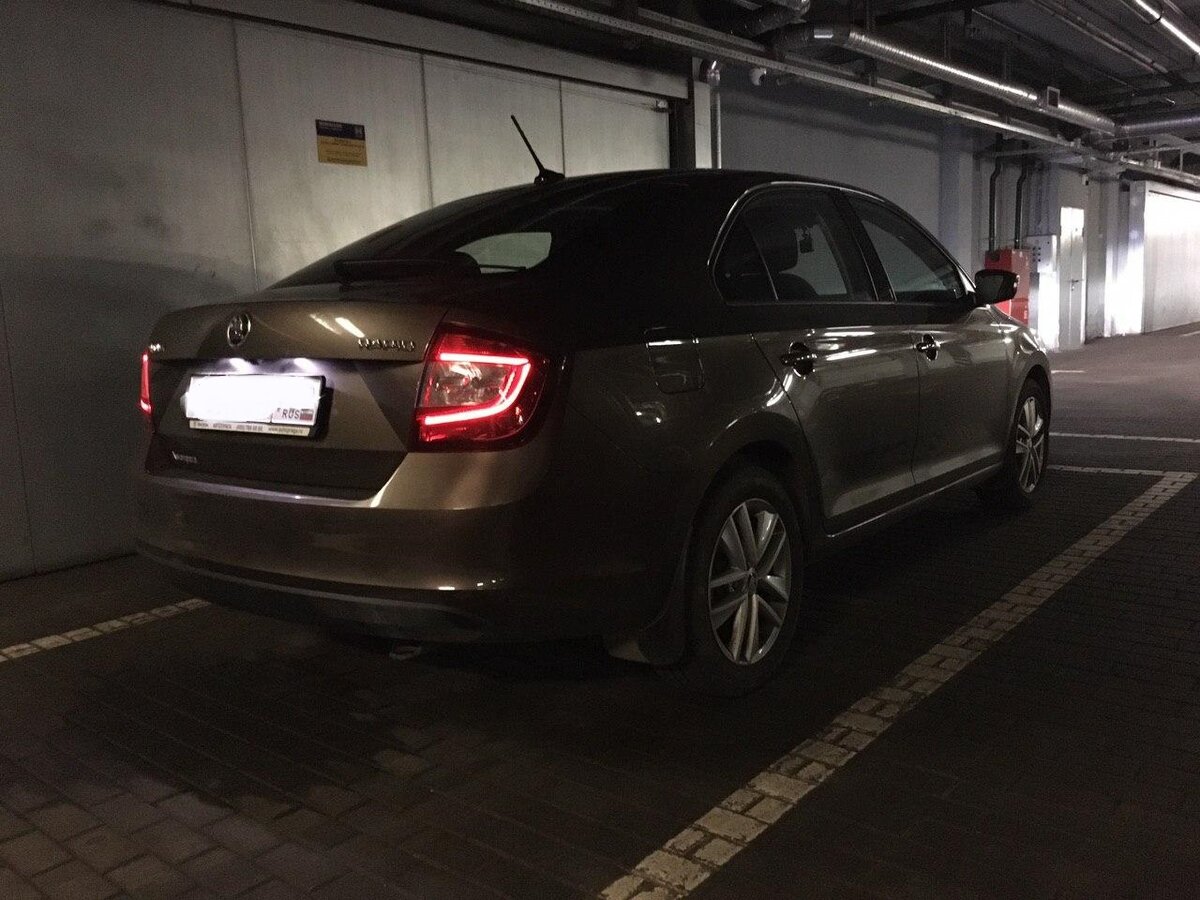 Skoda Rapid 2019 1.6 AT Style(зимний пакет+оптика), вид сзади+ с правой стороны