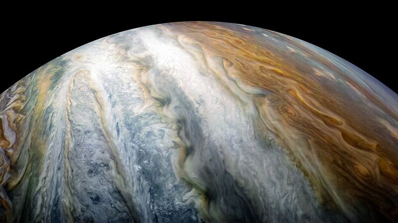 Из-за причудливых облачных узоров поверхность Юпитера выглядит просто фантастически