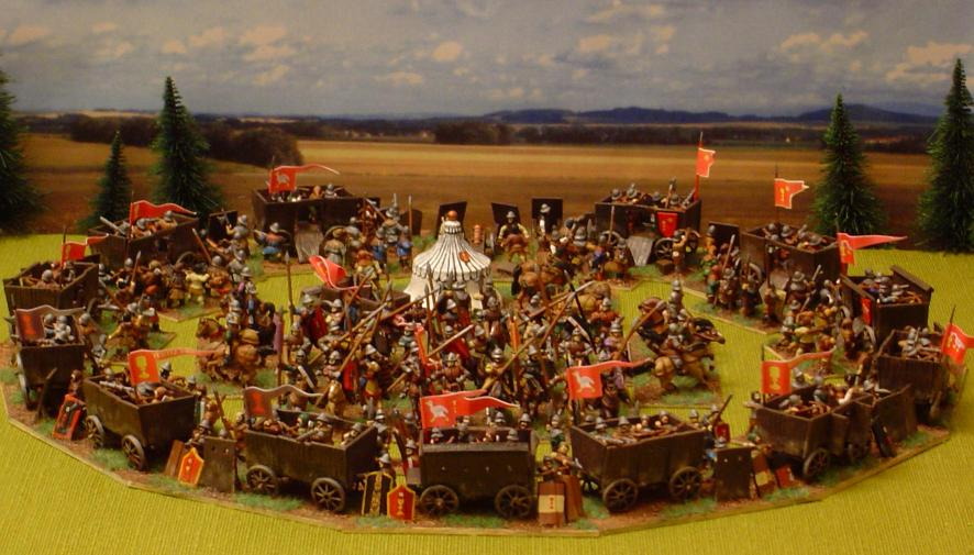 Круг из сцепленных возов, за которым укрываются граждане с древковым оружием, а также луками, арбалетами и огнестрелом. Как-то так выглядит энтот самый вагенбург, только в норме должен быть в десятки раз поболее