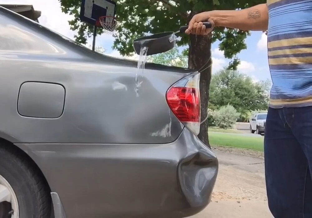 Ремонт вмятины крыла кипятком 