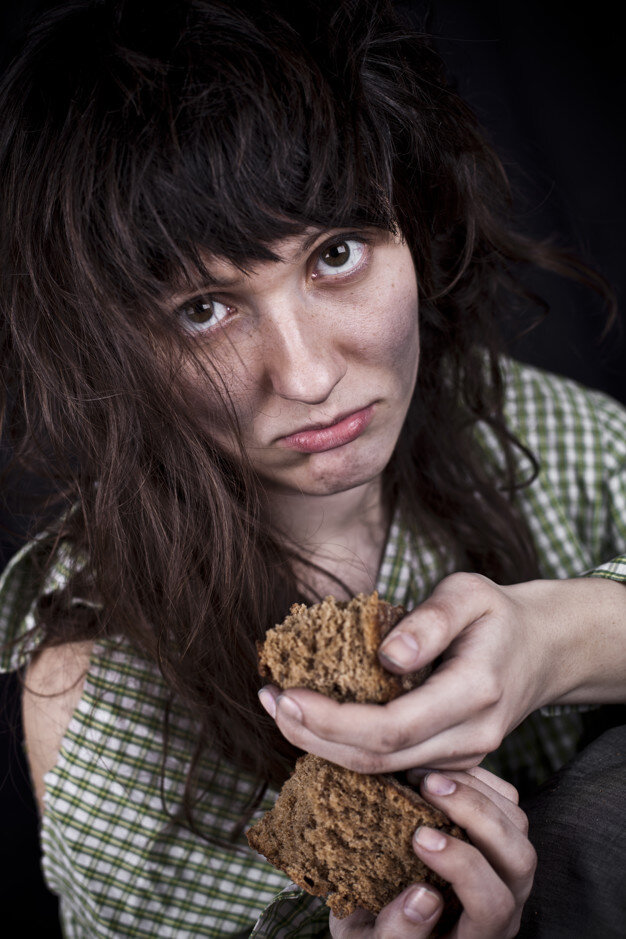 https://image.freepik.com/free-photo/poor-beggar-woman-with-a-piece-of-bread_93314-388.jpg