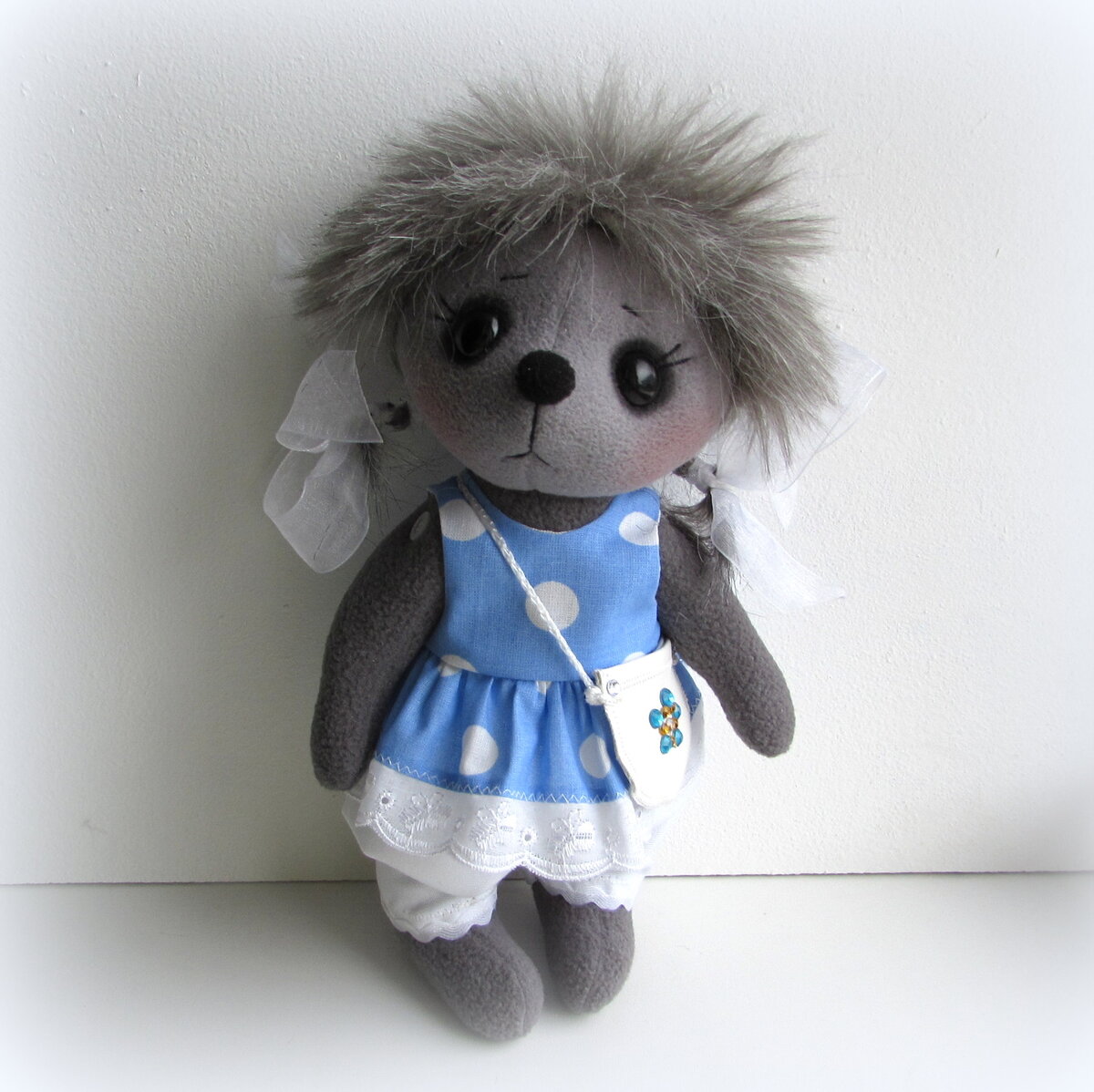 Ежик-девочка с косичками