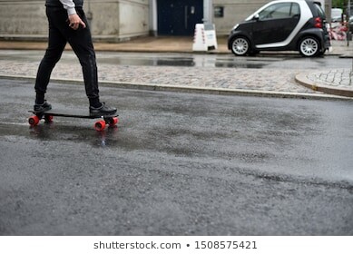 https://image.shutterstock.com/image-photo/business-man-rides-electric-skateboard-260nw-1508575421.jpg