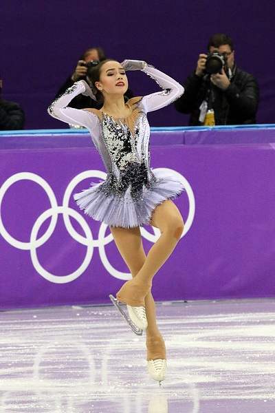 "Alina Zagitova at the 2018 Winter Olympic Games - Short program 17.jpg" by David W. Carmichael is licensed under CC BY 3.0
