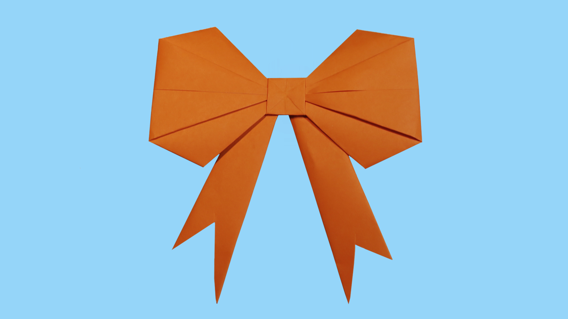 Оригами: пошаговое изготовление бантика из бумаги