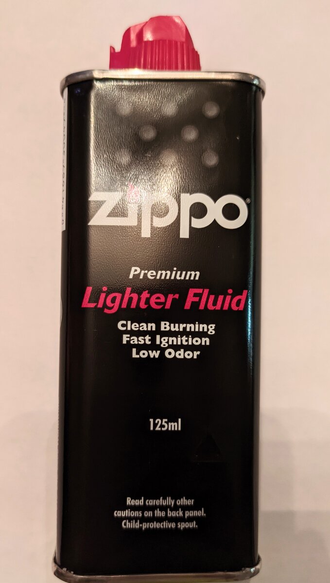 Штамп находится с правой стороны от объёма канистры.