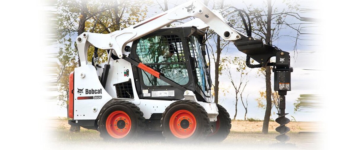 Мини погрузчик Bobcat S530 с навесным оборудованием