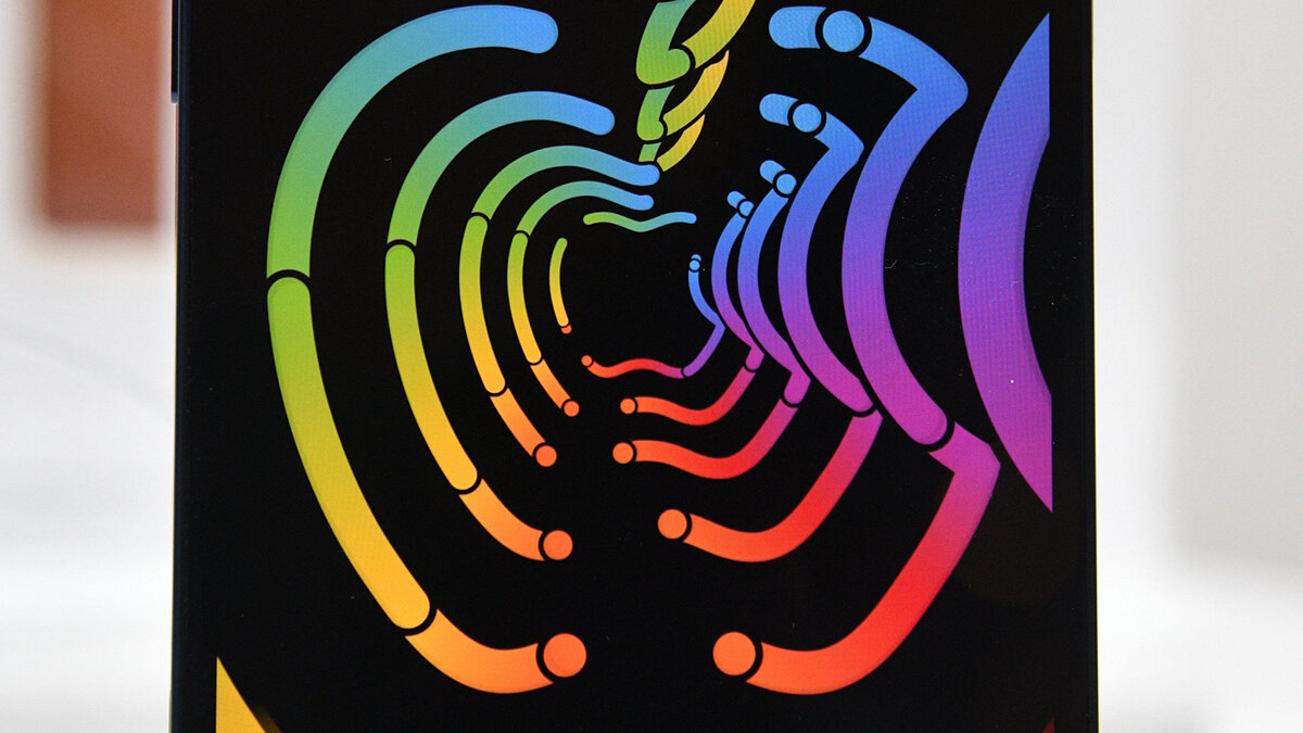    Заставка на экране смартфона компании Apple© РИА Новости . Евгений Биятов