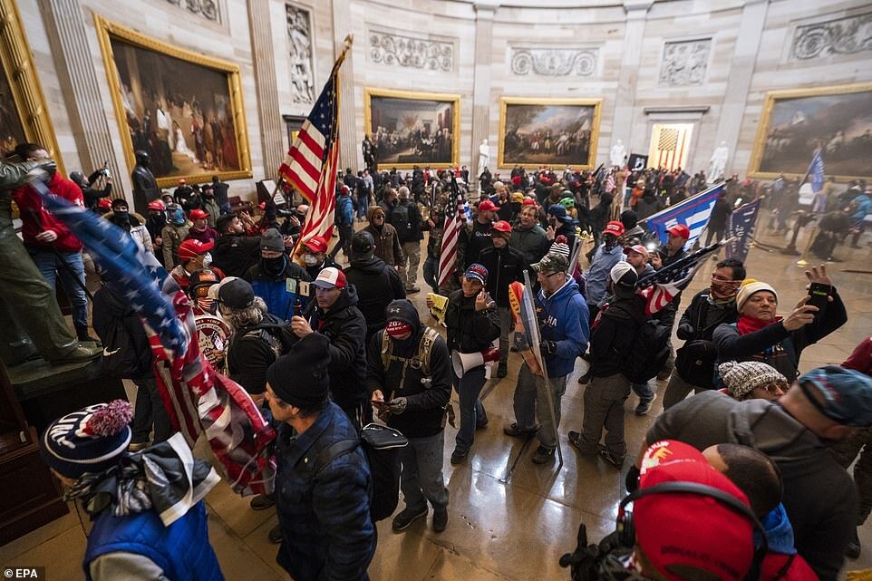 https://www.dailymail.co.uk/news/article-9121381/Capitol-Building-stormed-Trump-supporters-leaving-four-dead.html