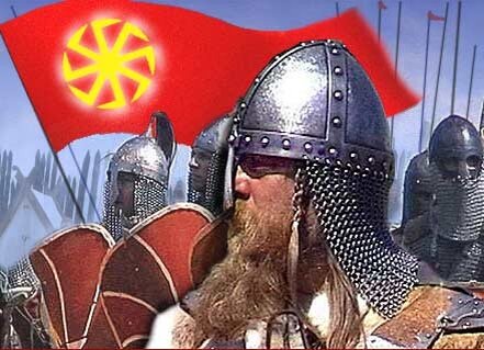 На красном знамени символ русского бога Сварога,ведущего своих детей на бой с силами тьмы,жаждущих превратить русских в рабов.