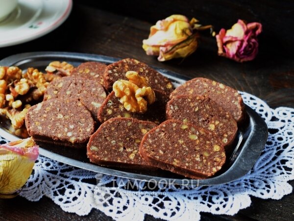 Печенье сливочное - 250 г 
Какао - 3 ст.л.

Сгущенное молоко - 200 г

Орехи грецкие - 100 г

Сливочное масло - 100 г