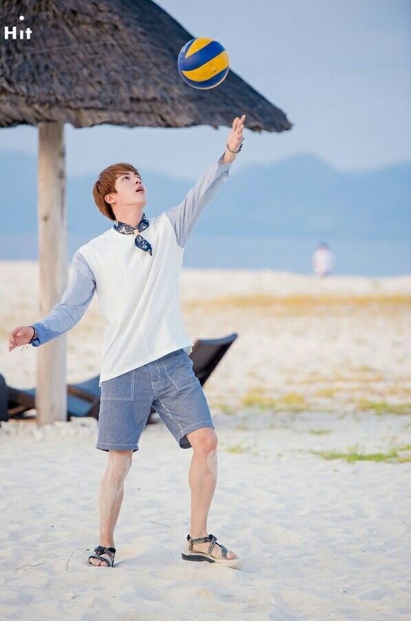 BTS. Jin's playing volleyball