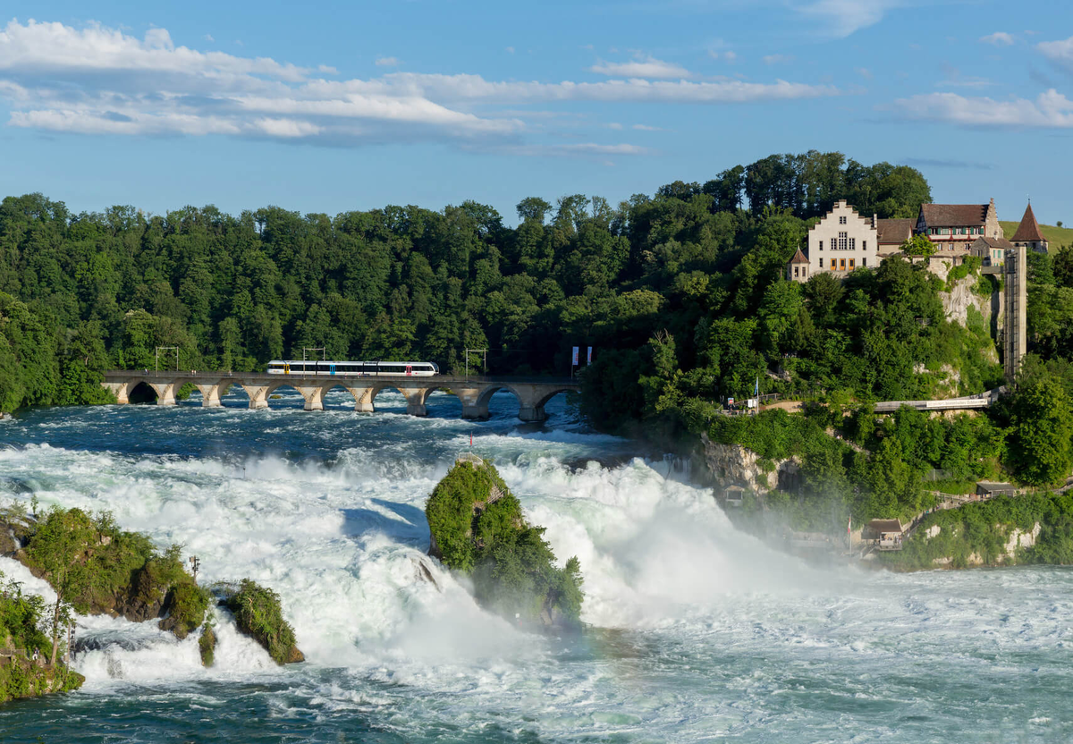 Рейнский водопад. Рейнский водопад Шаффхаузен. Rheinfall Швейцария. Рейнский водопад (Rhine Falls). Райнфаль водопад в Швейцарии.