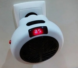 Портативный обогреватель в розетку Warm Air Bloower 