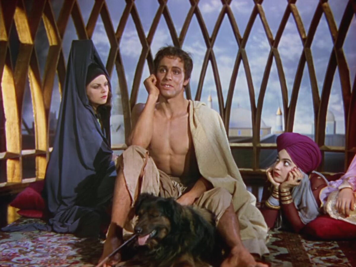 Ослепший Ахмед и превращенный в собаку Абу вновь оказались во дворце Джаффара