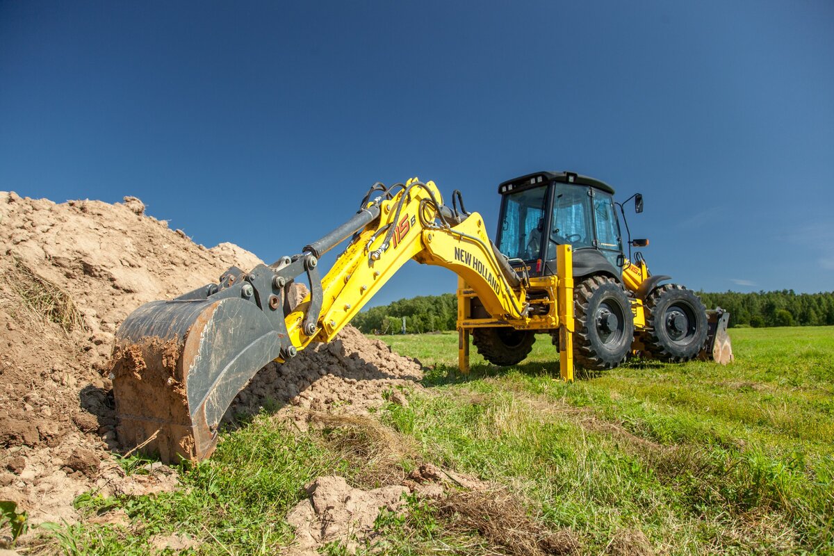New holland b80b. New Holland b115. Ньюхолонд 115 экскаватор погрузчик. New Holland b100b. Экскаватор New Holland b1100.