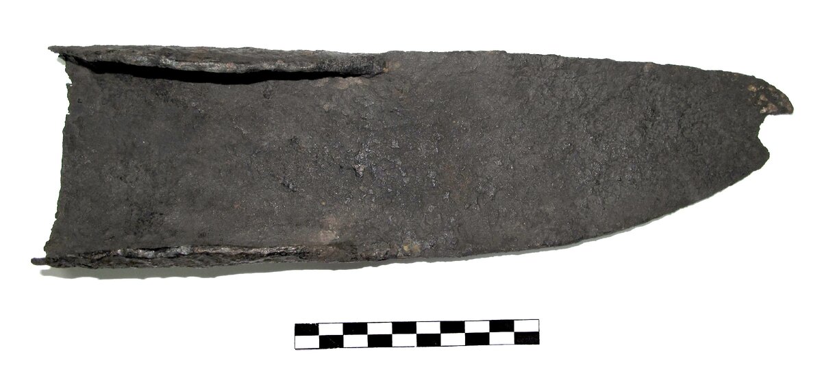 Сошник (Деталь сельскохозяйственного пахотного орудия - сохи. В виде массивной узкой заостренной пластины  с  втулкой на конце), XVI-XVII вв. Из собрания музея-заповедника "Куликово поле"