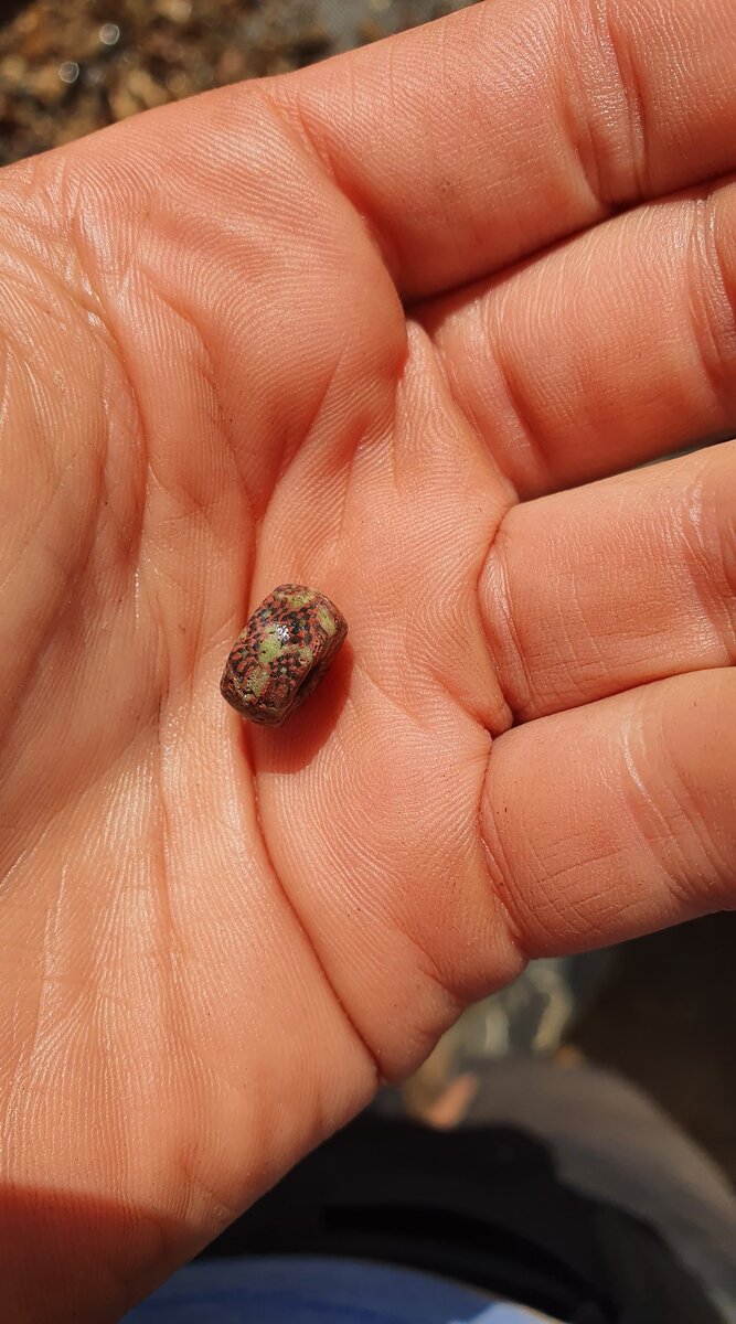 Фото найденной в Клинтхольме бусины. Фотография из археологического музея Хардеслева

