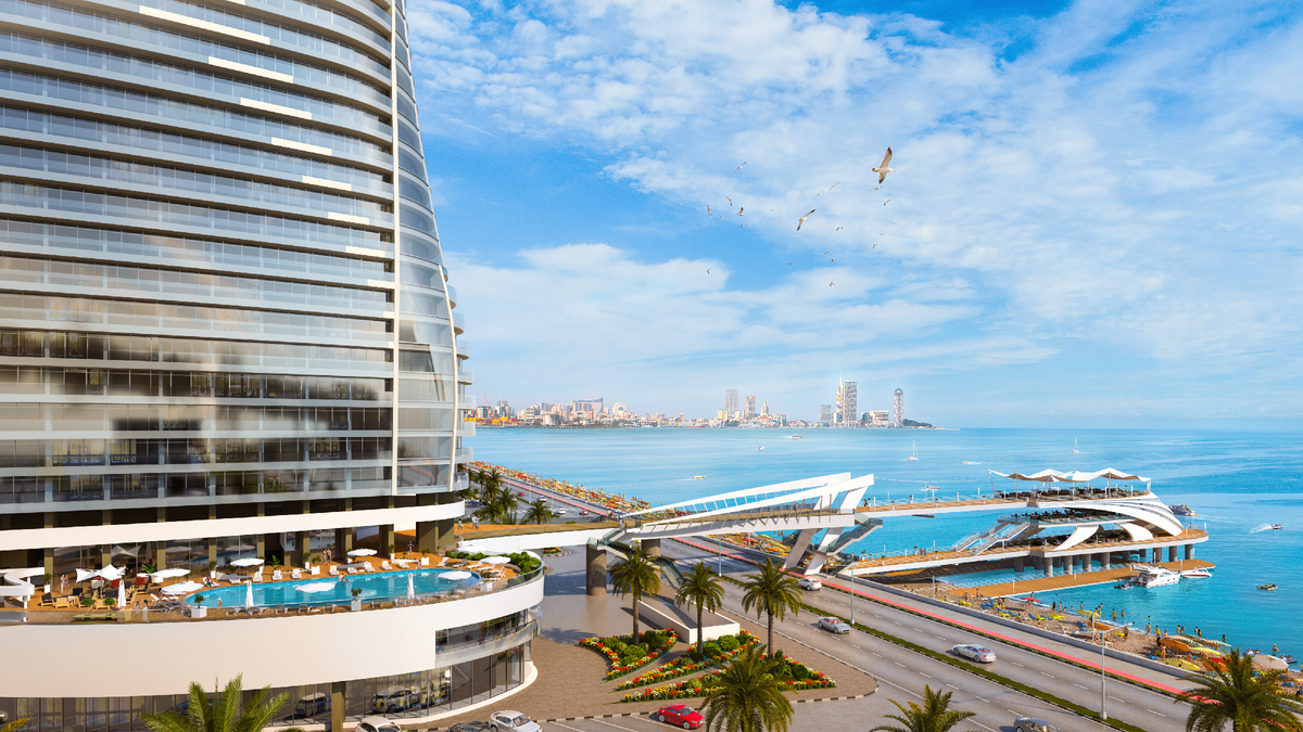 Здесь видно открытый бассейн, многоуровневый пирс и входную группу комплекса