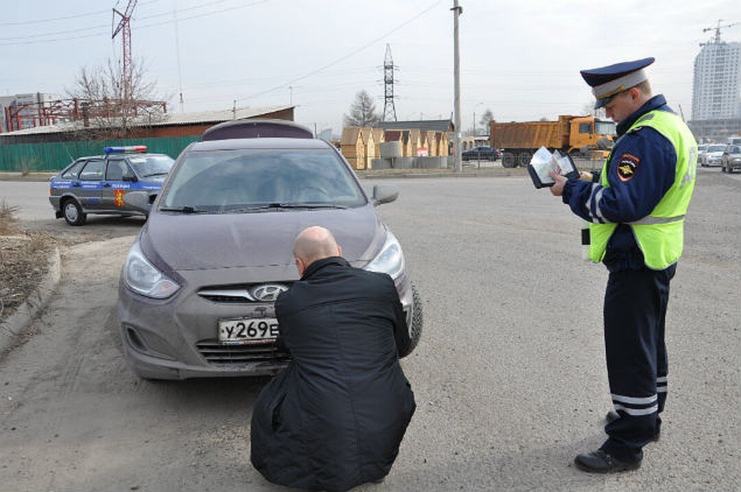 Штраф за езду в люке автомобиля