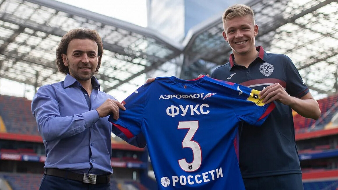 Бруно Фукс и Роман Бабаев - здесь еще пока доволен приобретением. Источник фото: www.sportsdaily.ru 