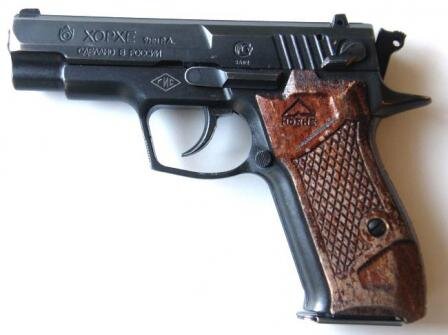 
  Травматический пистолет "Хорхе" со стальной рамкой, вид слева