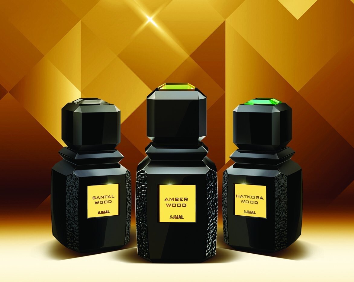 Amber wood мужские. Духи аджмал Амбер Вуд. Ajmal Amber Wood 100ml. Ajmal Amber Wood парфюмерная вода 100 мл. Амбер Вуд духи унисекс.