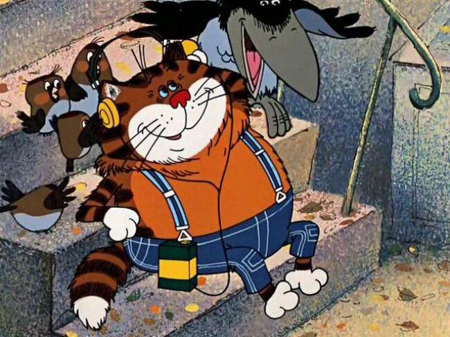 Кеша завидует коту - у рыжего жирдяя джинсы и плеер, а ещё - жвачка bubble-gum. Скриншот. Источник - YouTube.