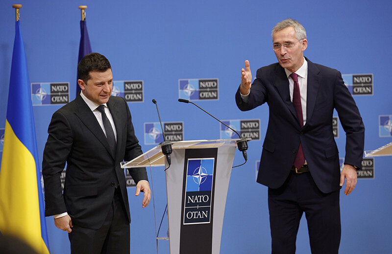    NATO Secretary General Jens Stoltenberg, right, gestures toward Ukraine's President Volodymyr Zelenskyy after a media conference at NATO headquarters in Brussels, Thursday, Dec. 16, 2021. (AP Photo/Olivier Matthys) editor