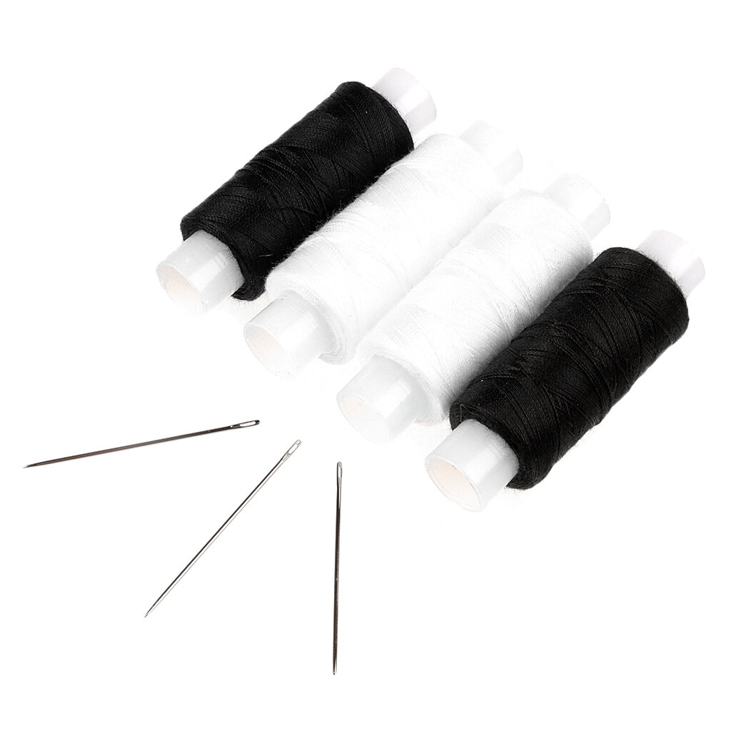 Несколько цветов ниток для шитья с иголками.