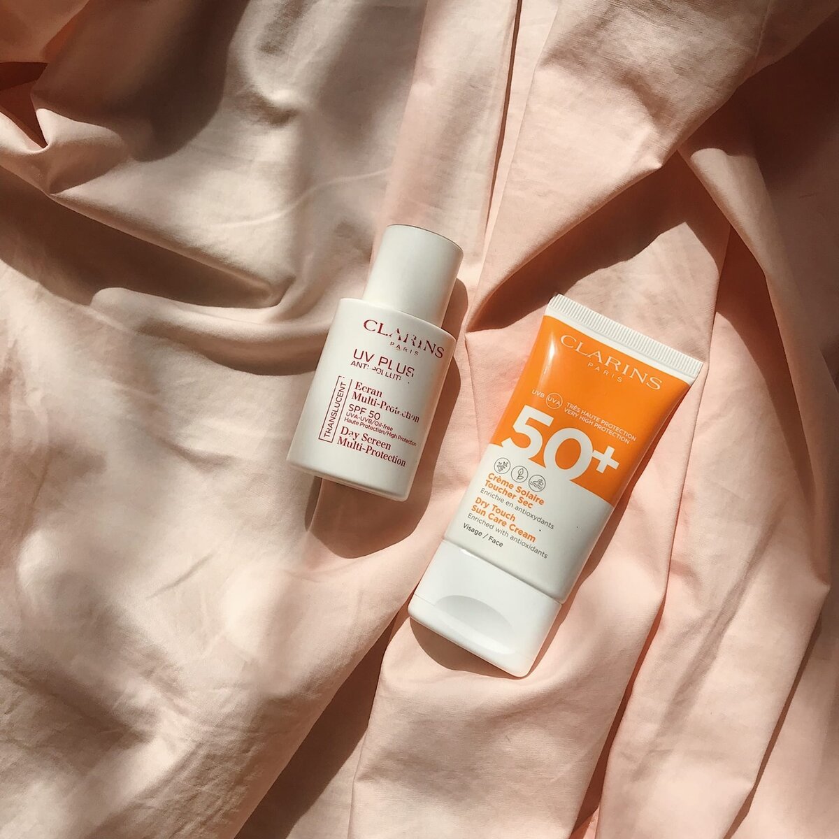 Clarins anti pollution. Clarins SPF 50. Clarins UV Plus Anti-pollution SPF 50. Тональный крем Эстетика. Clarins Crème solaire toucher sec visage срок годности.