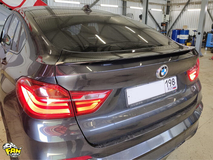 Установка спойлера на багажник БМВ (BMW) X4 F26