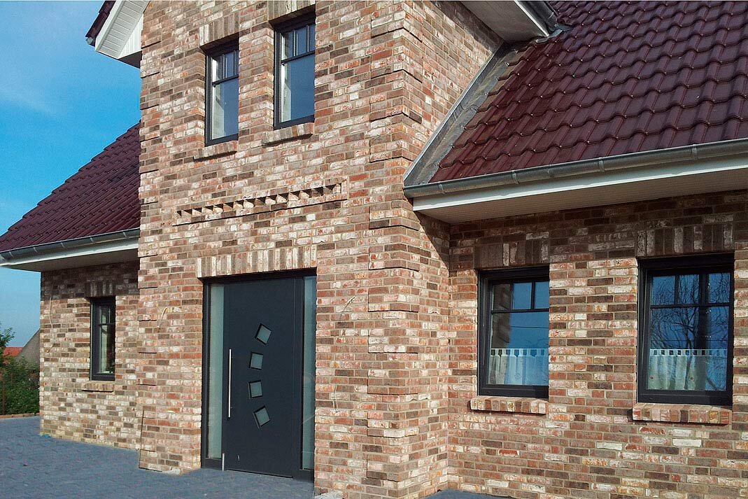 Отделка фасада кирпичем