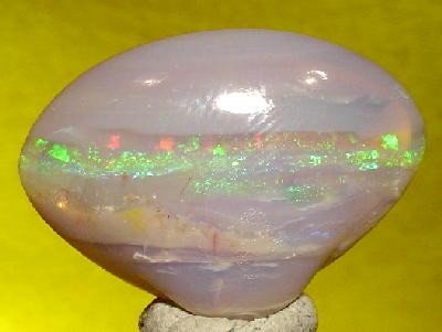 Драгоценный Опал из Кубер-Педи