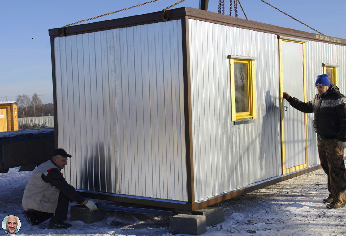 Монтаж бытовки с помощью крана